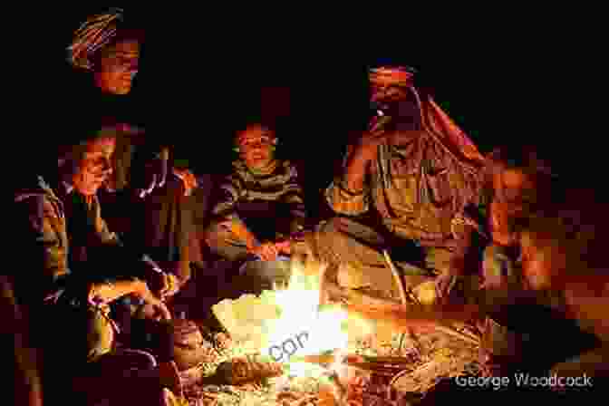 A Bedouin Family Sitting Around A Campfire In The Desert The Camel S Back: An Illustrated Edition
