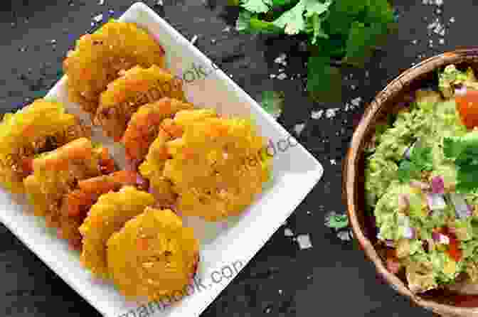 A Golden Brown Tostón, A Traditional Puerto Rican Appetizer Made From Twice Fried Green Plantains, Served With A Side Of Dipping Sauce. Puerto Rican Cookbook: 600+ Classic Puerto Rican Recipes For A Healthy Lifestyle