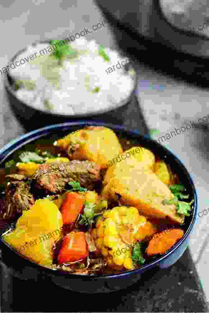 A Steaming Bowl Of Sancocho, A Traditional Puerto Rican Stew Featuring A Rich Broth, Various Meats, Vegetables, And Herbs. Puerto Rican Cookbook: 600+ Classic Puerto Rican Recipes For A Healthy Lifestyle