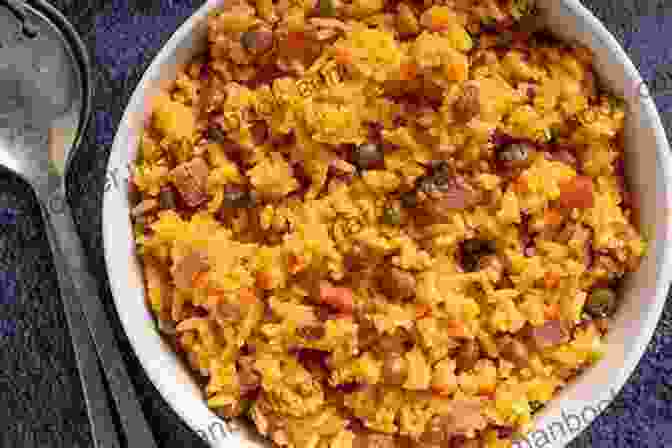 A Steaming Plate Of Arroz Con Gandules, A Traditional Puerto Rican Rice Dish Featuring Pigeon Peas, Sofrito, And Spices. Puerto Rican Cookbook: 600+ Classic Puerto Rican Recipes For A Healthy Lifestyle