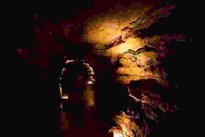 Ben Hood Standing In A Dimly Lit Underground Cave, Holding A Flashlight And Looking Ahead With Determination. Subterranean (Ben Hood Thrillers 15)